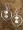 Silvery hoops with flashy white moonstone- simplicity at its best.
